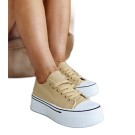 Tummanbeiget tennarit, joissa paksu Bahira-pohja