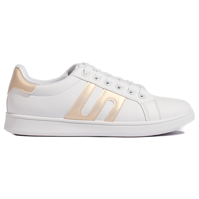 Valkoiset ja kultaiset naisten tennarit valkoinen