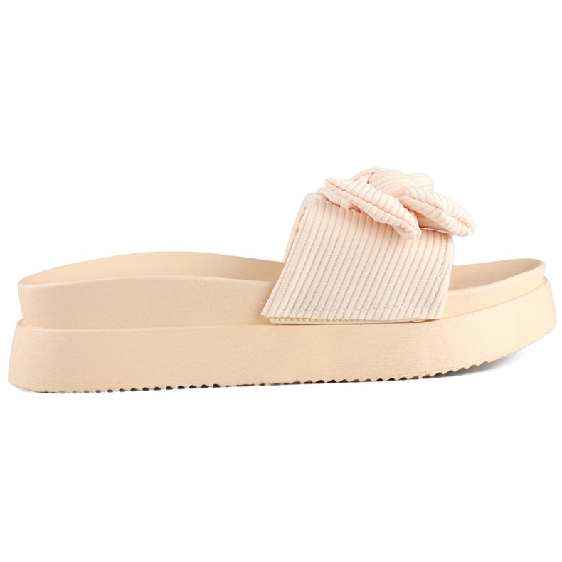 Beiget naisten tossut, joissa rusetti paksussa pohjassa