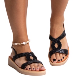 Mustat alustasandaalit, joissa Mifsa strassit Mustat alustasandaalit, joissa Mifsa strassit