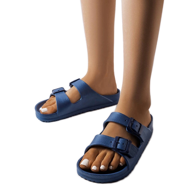 Tummansiniset kumiset liukumäet, joissa Eugene-soljet sininen