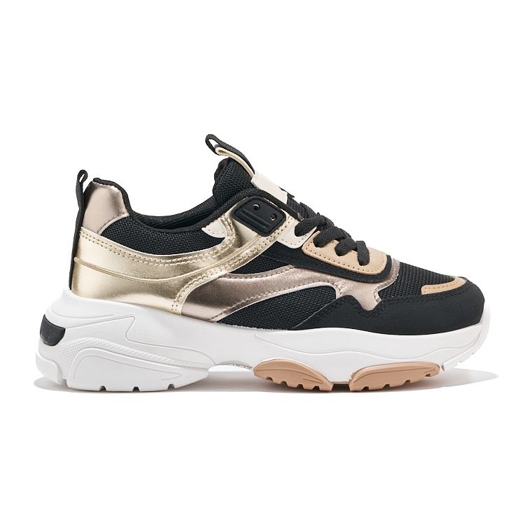 Mustat ja kultaiset lenkkarit, joissa paksu pohja