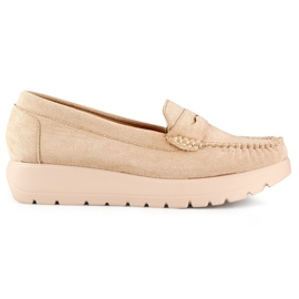 Mukavat beigenväriset naisten mokasiinit, joissa paksu pohja ja nahkainen sisäpohja