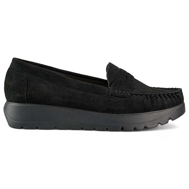 Mukavat mustat naisten mokasiinit, joissa paksu pohja ja nahkainen sisäpohja