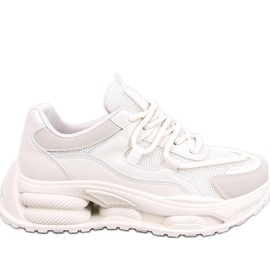 Naisten beigenväriset tennarit