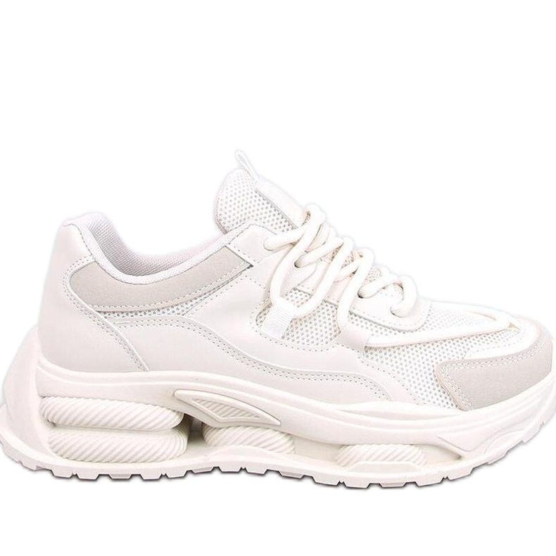 Naisten beigenväriset tennarit