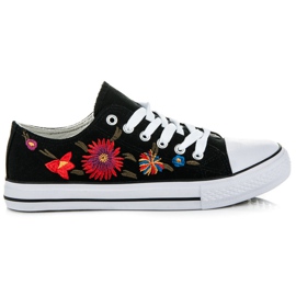 Nauhalliset lenkkarit, joissa on merkit musta