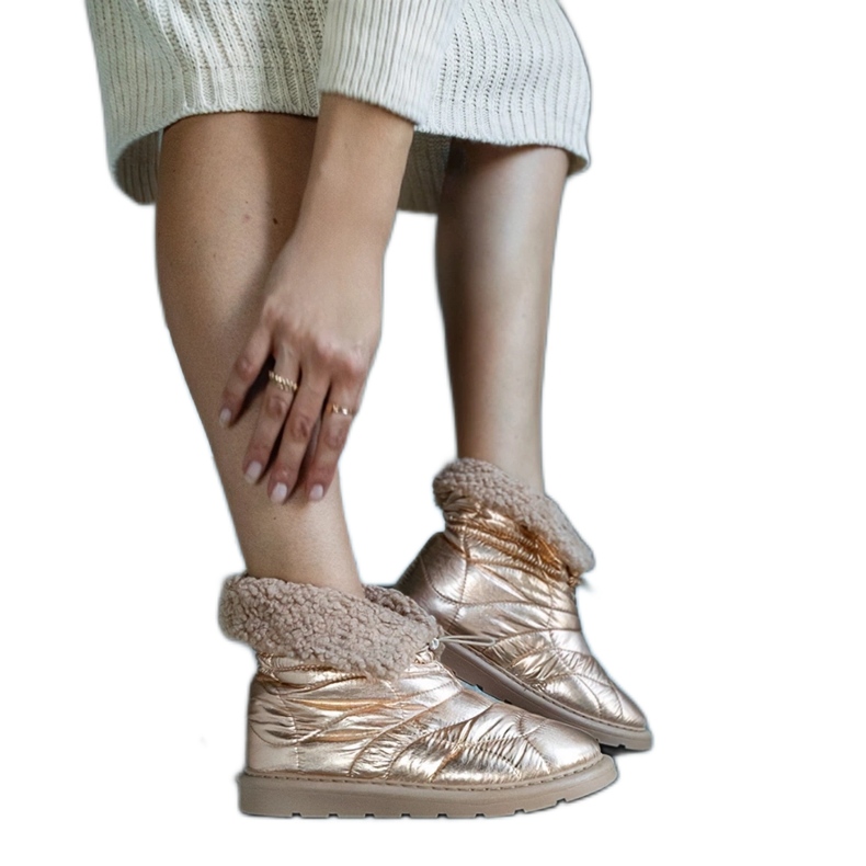 Caellita kullanväriset lumisaappaat hihansuilla kultainen