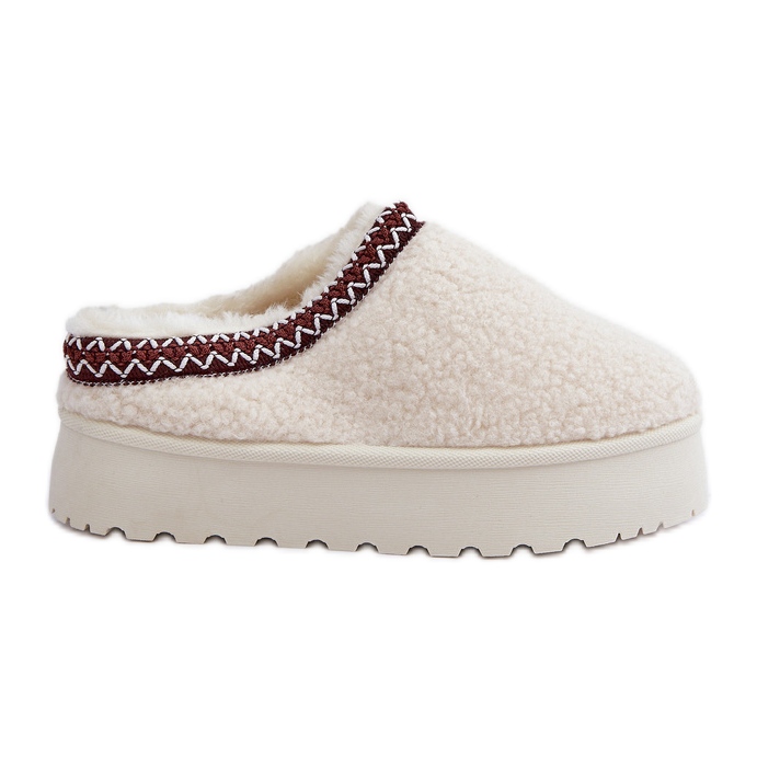 Vaalean beigenväriset lampaannahkaiset tossut turkistasolla