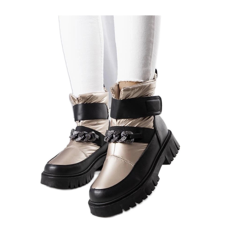 Kultaiset lumisaappaat ketjulla Ephraim - Solea