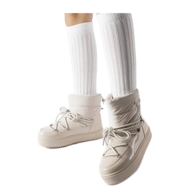 Beiget eristetyt lumisaappaat, joissa joustava Oslavia - Solea