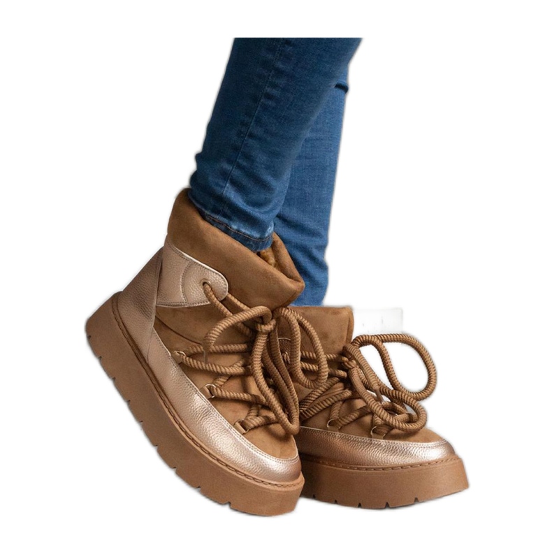 Turkiseristetyt alustalumisaappaat ruskea