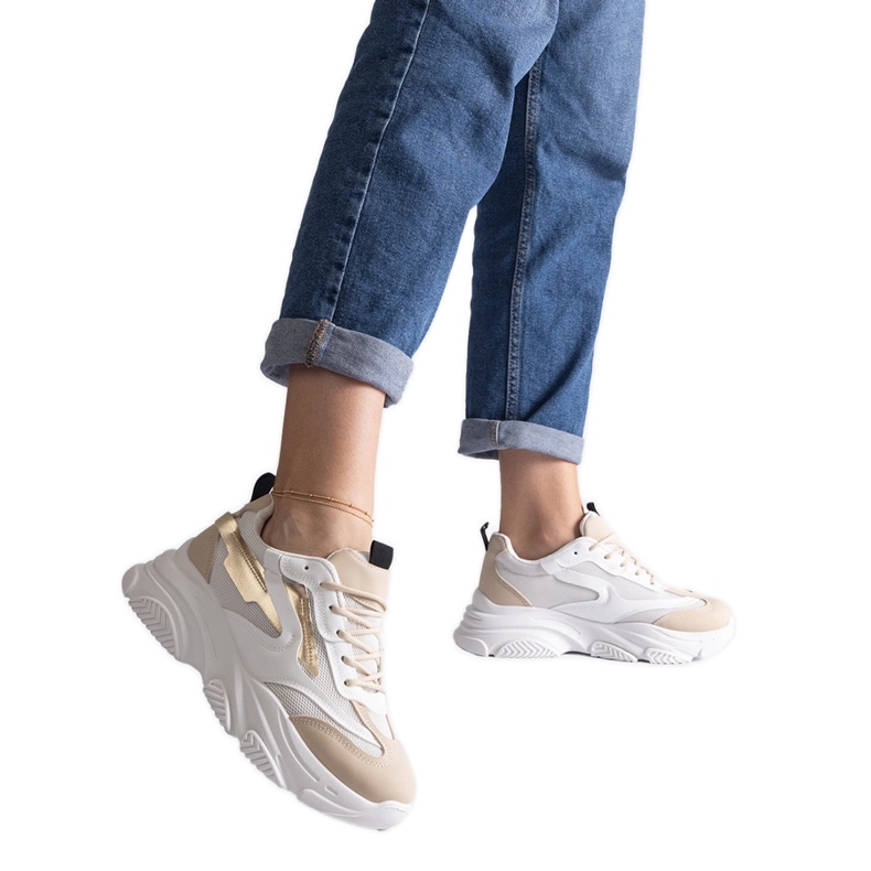 Naisten beigen ja kullanväriset tennarit