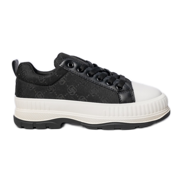 Naisten lenkkarit laiturilla musta