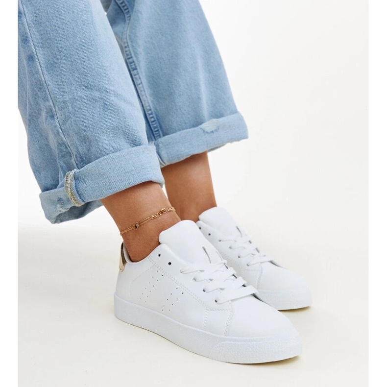 Valkoiset ja kultaiset Akila lenkkarit valkoinen