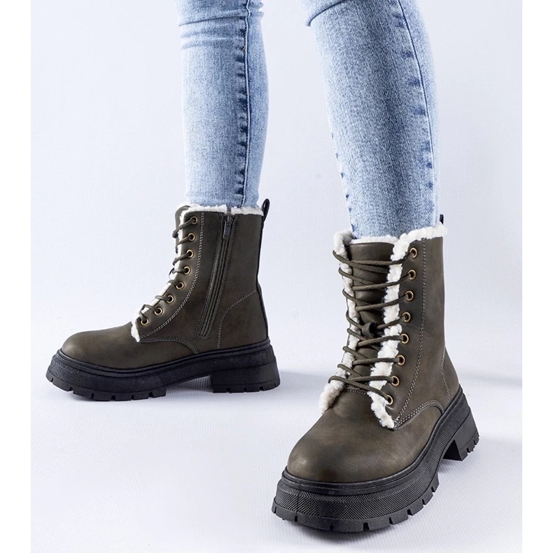 D/CEO Tadasunin vihreät eristetyt saappaat