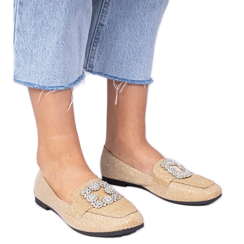 Kultaiset kimaltelevat leipät zirkonilla kultainen