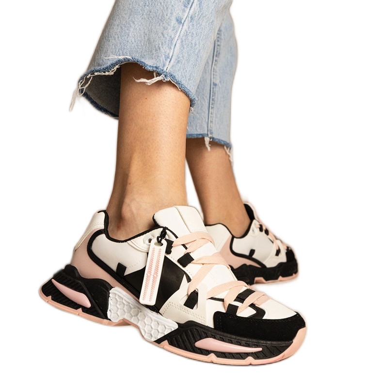 Vaaleanpunaiset naisten tennarit massiivisella pohjalla musta