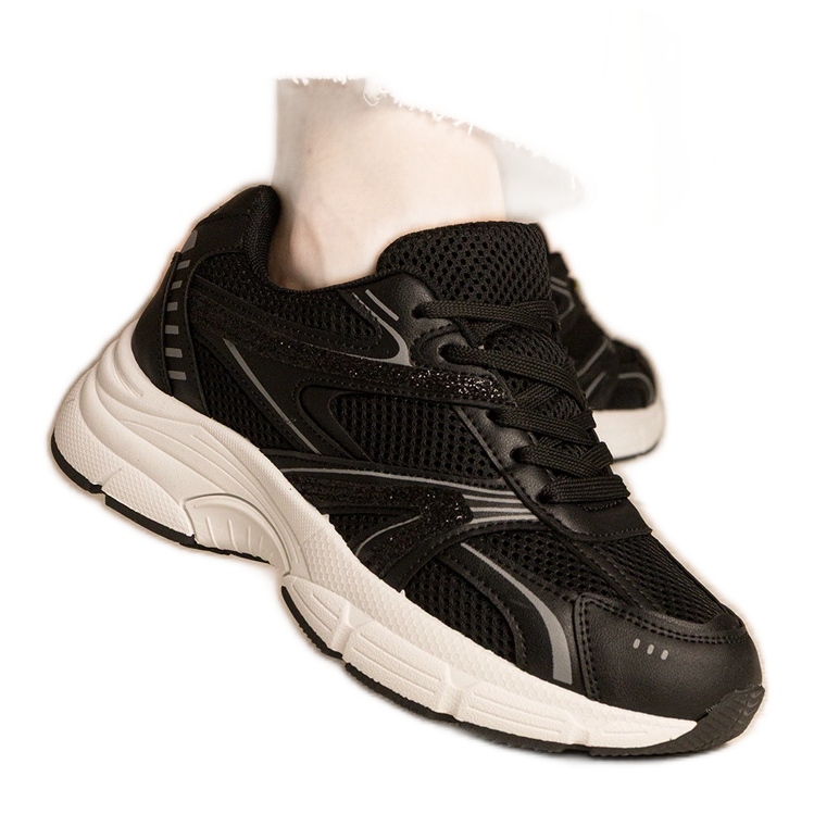 Mustat lenkkarit naisten urheilu kimaltelevat