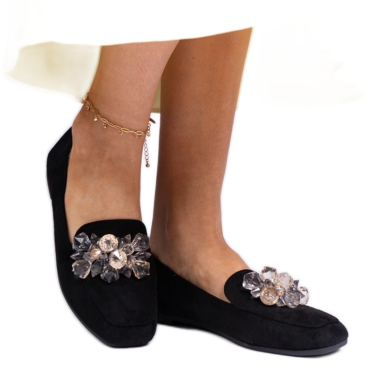 Kiteillä koristeltu mustat leimat