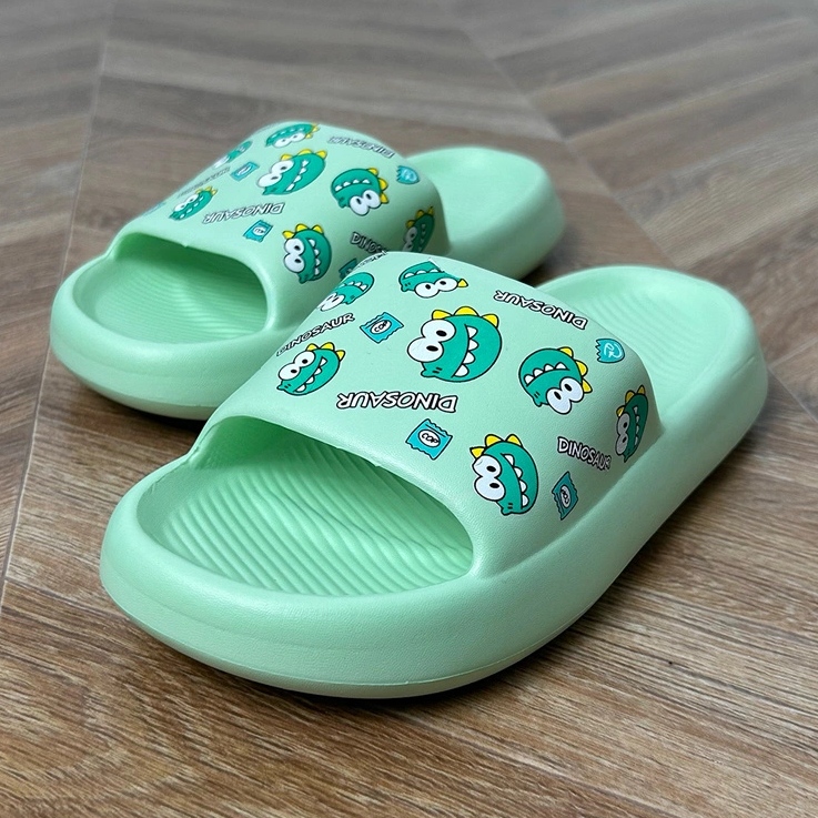 Vihreiden lasten flip flops painetulla vihreä