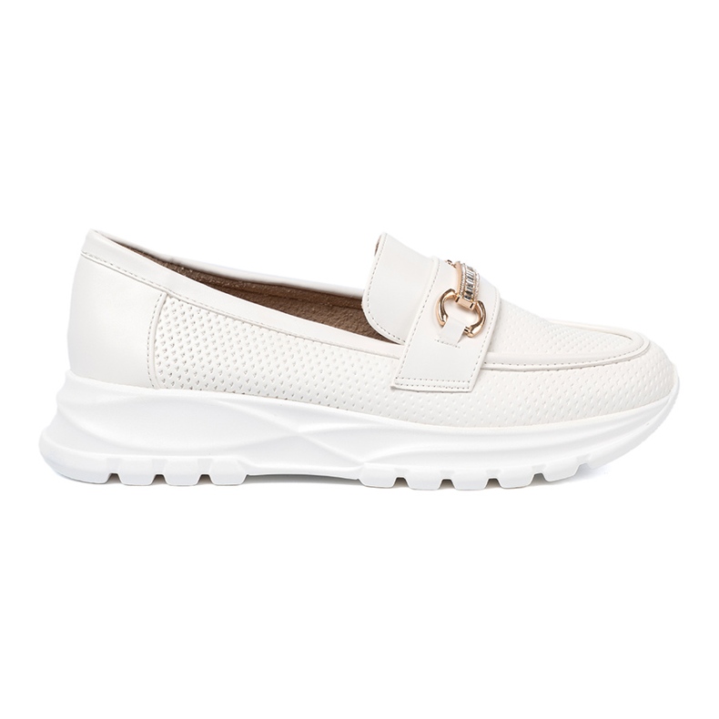 Shelvt Valkoiset leipät koristeellisella kultaisella elementillä. valkoinen