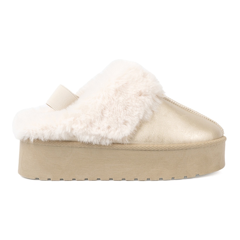 Shelvt Kultaiset kengät ja lumilähteet valkoisella turkilla kultainen