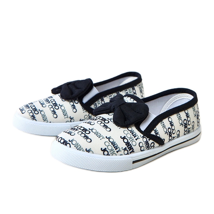 Valkoisten lasten lenkkarit, joissa on missi valkoinen