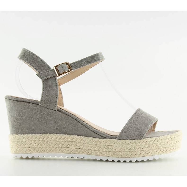 Harmaat harmaat sandaalit kiilakoroilla