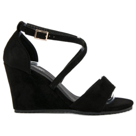 Mustat mokkanahkasandaalit