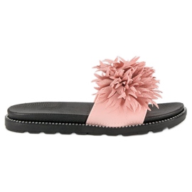 Tossut, joissa pompon vaaleanpunainen