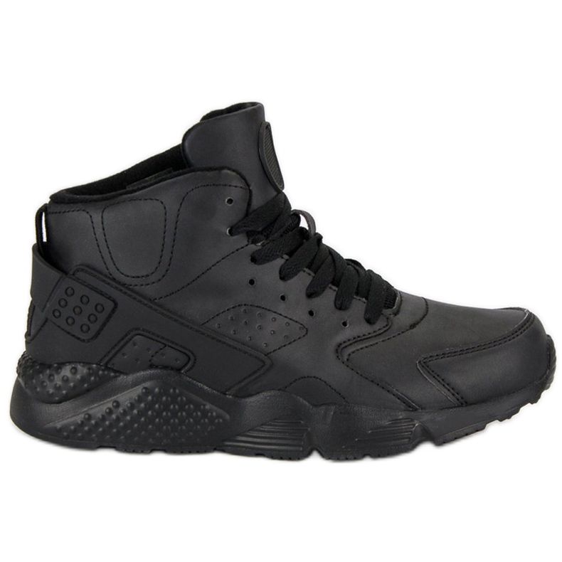 Mustat saappaat nilkan yläpuolella