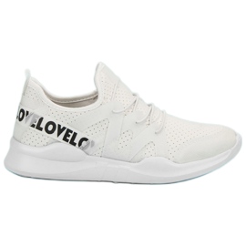 Valkoiset tekstiiliset urheilukengät valkoinen