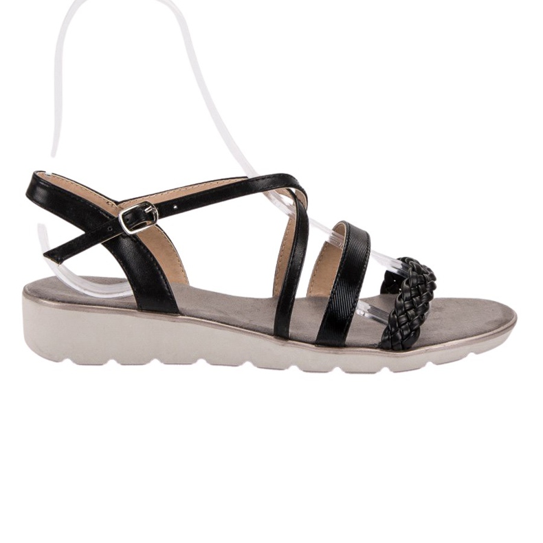 Kylie Mustat sandaalit alustalla