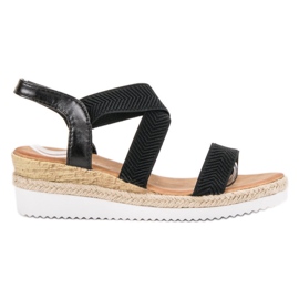 Anesia Paris Slip-on sandaalit alustalla musta