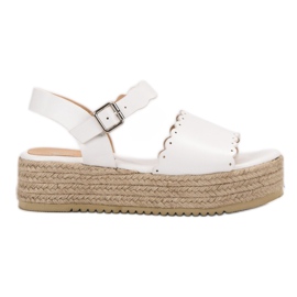 Balada Sandaalit alustalla valkoinen