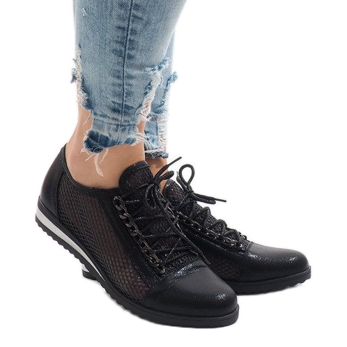 Mustat aukkokengät TL44