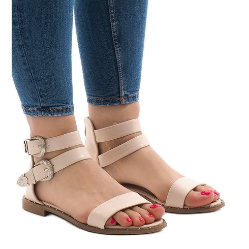 Vaaleanpunaiset litteät sandaalit, joissa 170 solki vaaleanpunainen