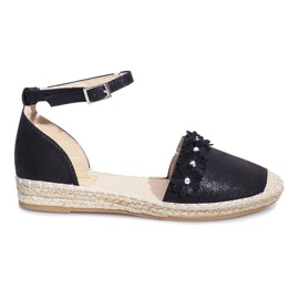 Mustat espadrillit Favaran kukilla