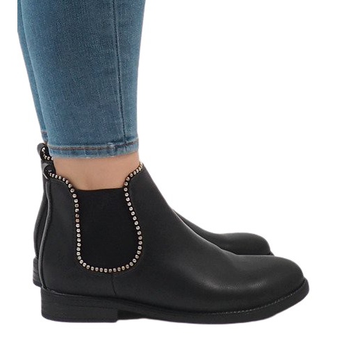 Mustat eristetyt saappaat, joissa kuminauha 1003-PA