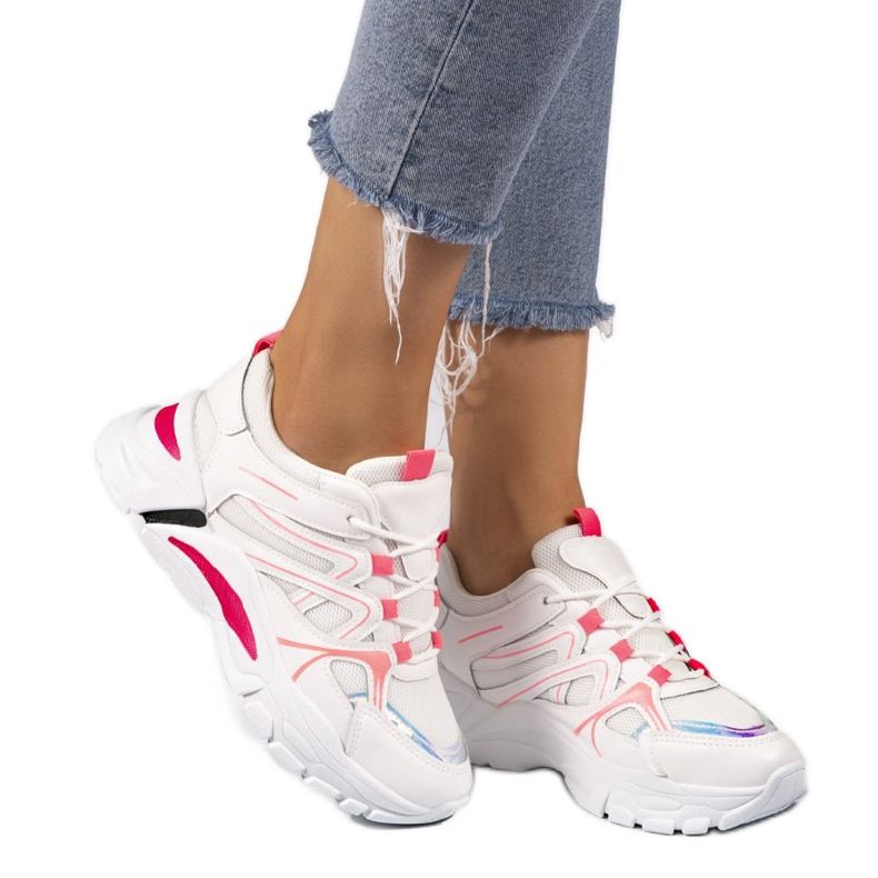 1070 valkoista urheilutossua vaaleanpunaisilla lisäosilla valkoinen vaaleanpunainen