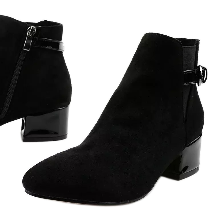 Mustat saappaat, joissa pieni pylväs Brizarisilta