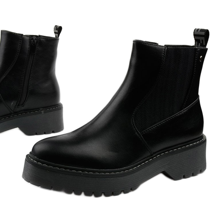 Mustat litteät saappaat Cavern-ekonahkaa