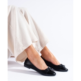 Klassiset mustat balettiasut Shelovet-rusetilla 1