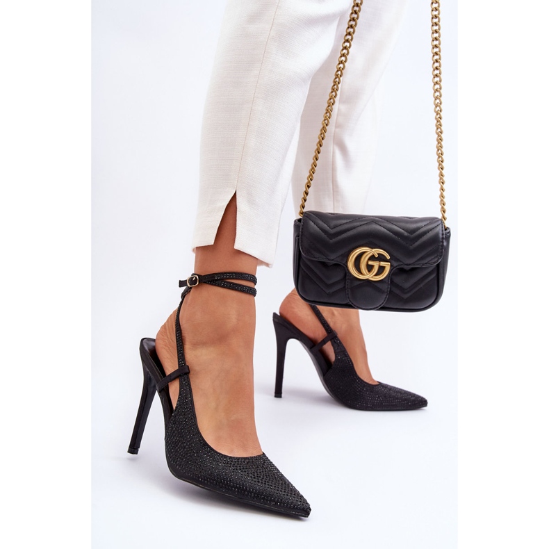 Klassiset pinssit, jotka on koristeltu zirkoneilla mustalla Gudalla 1