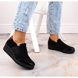 Naisten mustat kiilakengät Sergio Leonelta 1