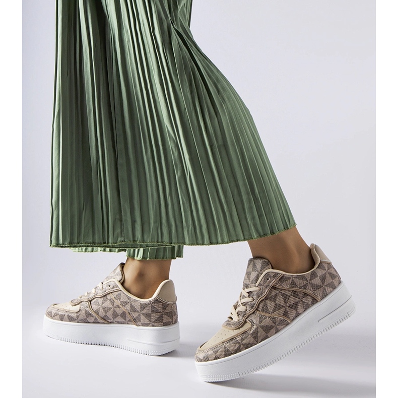 Inna Beiget lenkkarit, joissa on Sands-monogrammi 1