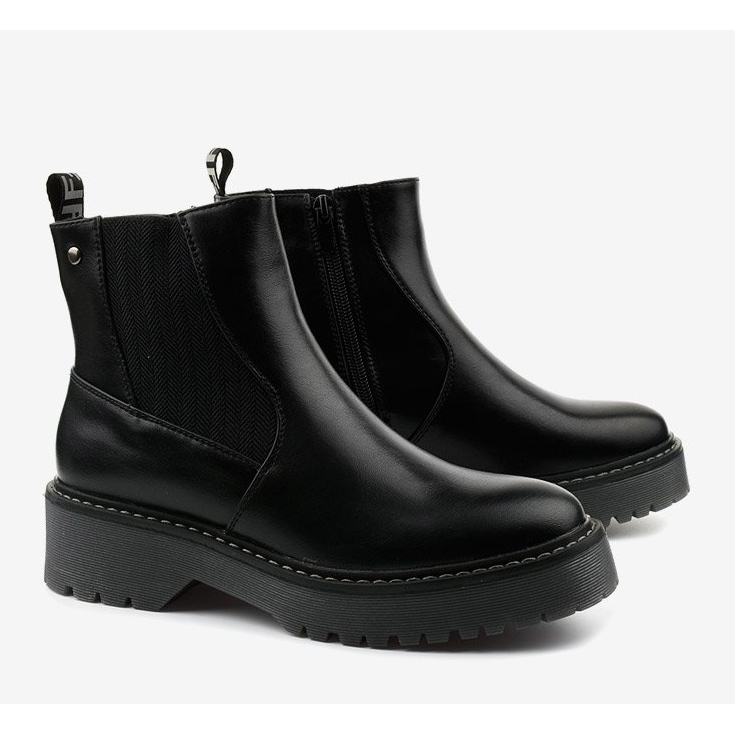 Mustat litteät saappaat Cavern-ekonahkaa 1