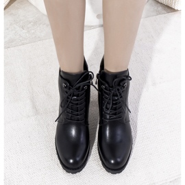 Mustat eristetyt saappaat Padilla-sidoksella 1