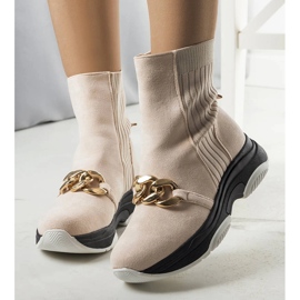 Beiget eristetyt saappaat Ulster-ketjulla 1